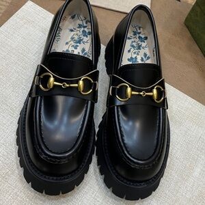 Gucci Black Leather Loafers with Gold Bit Detail